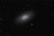 中央の塵が特徴的な、かみのけ座の「黒眼銀河」