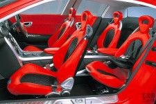 「RX-8…じゃない！」 マツダが斬新ドアの「ロータリー・スポーツカー」公開！ リトラを彷彿させる「隠れヘッドライト」採用で超カッコいい“RX-EVOLV”に反響あり