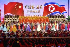 平壌で開かれた、北朝鮮と中国との国交樹立75周年の記念行事の開幕式＝12日（共同）