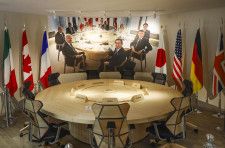 G7広島サミット記念館で展示されている、首脳会議で実際に使用された円卓と椅子＝17日午後、広島市