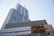 　４月８日、中国不動産開発会社の世茂集団は、１５億７９５０万香港ドル（２億０１７５万米ドル）の債務を巡り中国建設銀行（アジア）から清算申し立てを受けたと発表した。写真は２０２２年１月、上海の世茂インターナショナルプラザで撮影（２０２４年　ロイター/Aly Song）