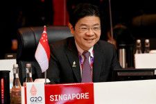 ５月１３日、シンガポールのローレンス・ウォン次期首相（写真）は、ガン・キムヨン貿易産業相を副首相に昇格させる内閣人事を発表した。バリで２０２２年７月代表撮影（２０２４年　ロイター）
