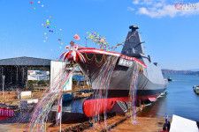 2023年11月14日、岡山県にある三菱重工マリタイムシステムズ玉野本社工場で命名・進水した海上自衛隊向けの新型護衛艦「ゆうべつ」（深水千翔撮影）。